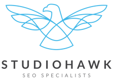 a logo with a bird in the middle
